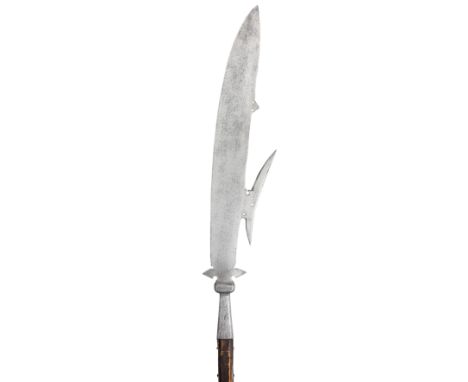 **AN ITALIAN GLAIVE (FAUCHARD), PROBABLY LATE 16TH CENTURY with curved flat knife-like blade formed with a low lobe on the ba