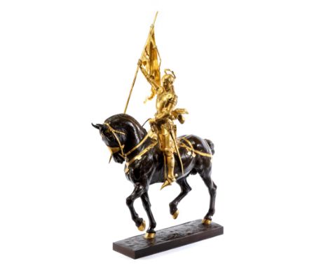 **EMMANUEL FRÉMIET (FRENCH 1824-1910): JEANNE D'ARC À CHEVAL later parcel-gilt and brown repatinated bronze, the equestrian J