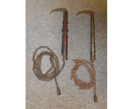 TWO JAPANESE PICKS (KAMA YARI), EDO PERIOD the first with hooked blade (rusted), white metal-mounted wooden haft covered with