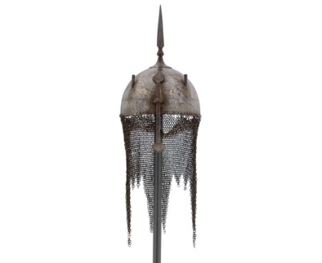 **AN INDO-PERSIAN HELMET (KULAH-KHUD), LATE 19TH CENTURY with hemi-spherical skull fitted with a central spike, a pair of plu