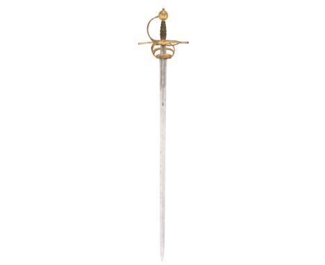 A FINE GERMAN SWEPT-HILT RAPIER WITH GILT-IRON HILT, CIRCA 1620-30 with tapering blade of flattened-hexagonal section, each f