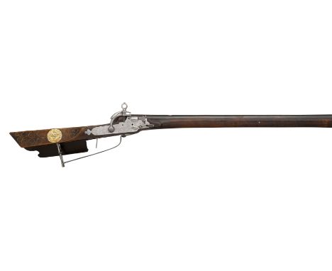 A BALTIC SNAP-LOCK BIRDING RIFLE, CIRCA 1650 of characteristic form, with slender swamped octagonal sighted small-bore barrel