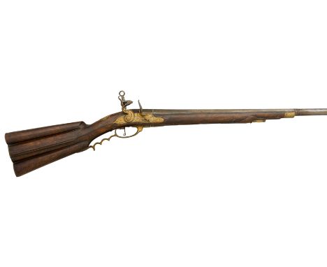 A 21-BORE FLEMISH FLINTLOCK FOWLING-PIECE, IN THE SPANISH TASTE, EARLY 18TH CENTURY with two-stage barrel with turned girdle,