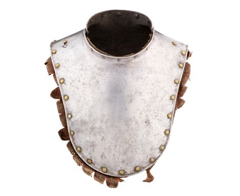 A GERMAN GORGET, EARLY 17TH CENTURY formed of a single plate front and rear, each with a low upstanding flange at its neck-op