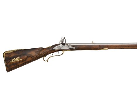 A 42-BORE GERMAN FLINTLOCK RIFLED SPORTING CARBINE SIGNED GEORG C. FREUND A FURSTENAU, DATED 1742 with swamped octagonal sigh