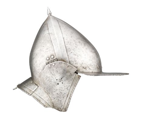 A GERMAN BURGONET WITH EMBOSSED DECORATION IN THE 'BLACK AND WHITE' FASHION, THIRD QUARTER OF THE 16TH CENTURY with pointed o