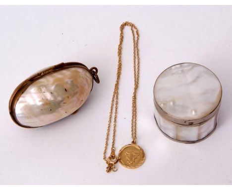 Mixed Lot: gilt, brass and freshwater pearl mounted canister of oval form with hinged body and ring suspension together with 