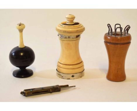 Mixed Lot: silver mounted and ivory pepper grinder of typical waisted form, together with a lignum and ivory mounted sander, 