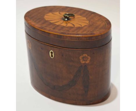 Regency mahogany boxwood and kingwood inlaid tea caddy, of oval form with hinged cover and ring handle, with rosette and swag