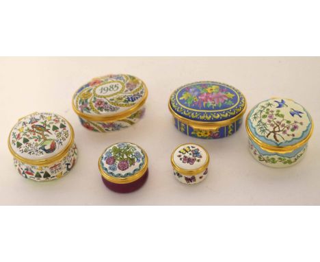 Group of Halcyon Days enamel boxes including one for 1985, one with design after 18th century samplers and a further one afte