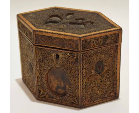 Early 19th century scroll paperwork tea caddy of hexagonal form with hinged cover and void interior (losses throughout), widt