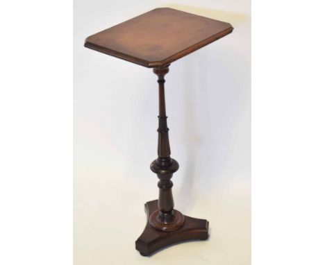 Mahogany pedestal table, canted rectangular top raised on moulded support with tripod base, 38cm wide  