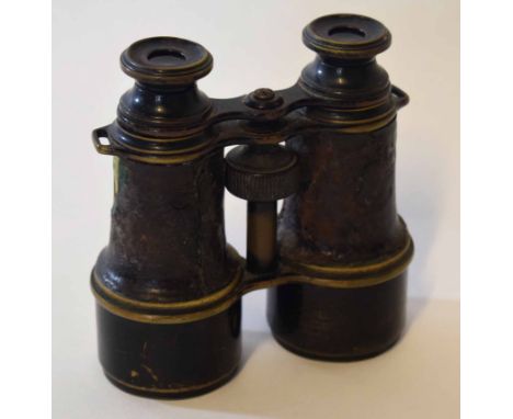 Pair of early 20th century patinated brass binoculars of typical form with screw adjustment, MK V SPL, 58689 and marked with 