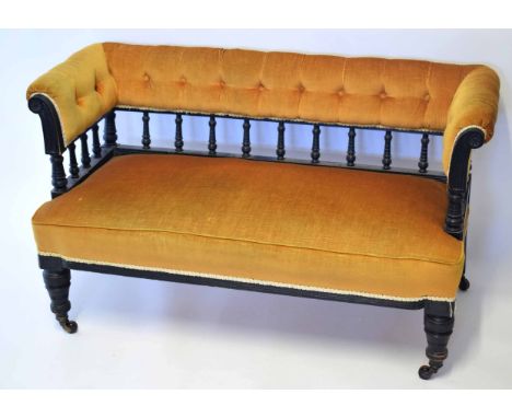 Late Victorian ebonised cottage sofa upholstered in ochre with a button back, 120cm wide 