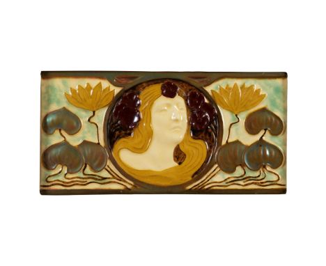 ZSOLNAY, PECS ART NOUVEAU TILE, CIRCA 1905depicting a fair haired maiden, surrounded by lily pads, eosin glazed earthenware t