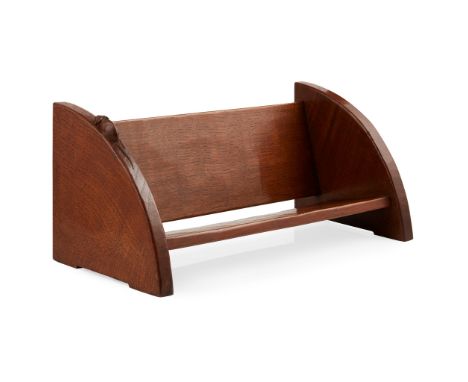 ROBERT 'MOUSEMAN' THOMPSON (1876-1955) OAK BOOKRACK, 1950S-60Swith curved ends uniting a slanted back panel and single shelf,