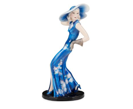 GOLDSCHEIDER, AUSTRIA ART DECO CERAMIC FIGURE OF A LADY, CIRCA 1925modelled in a blue dress and large hat, printed and incise