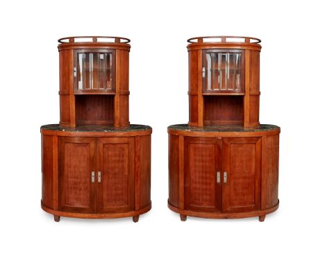 AUSTRIAN SCHOOL PAIR OF SECESSIONIST INLAID WALNUT CABINETS, CIRCA 1900the superstructure each with faceted glazed door enclo