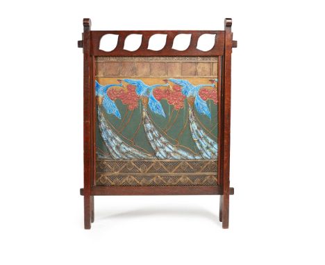 ATTRIBUTED TO LIBERTY &amp; CO., LONDON ARTS &amp; CRAFTS OAK FIRESCREEN, CIRCA 1910the pierced frame inset with embossed pol