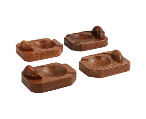 ROBERT 'MOUSEMAN' THOMPSON (1876-1955) A GROUP OF OAK ASHTRAYS, CIRCA 1950S-60Seach of canted rectangular form with dished ci