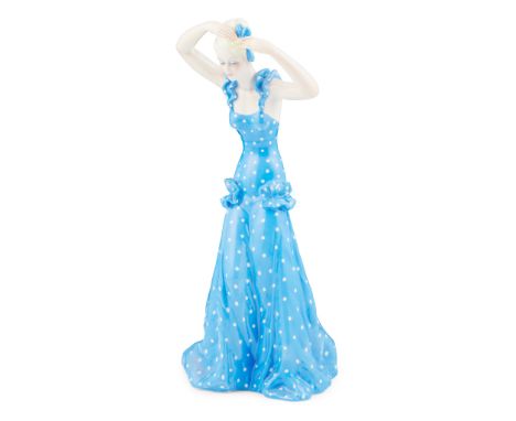 RONZAN, ITALY CERAMIC FIGURE, 20TH CENTURYdepicting a girl in a blue polka-dot dress, painted marks ORIGINALE/GIO RONZAN/ MAD