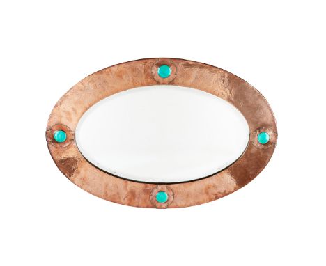 MANNER OF LIBERTY &amp; CO., LONDON ARTS &amp; CRAFTS COPPER AND ENAMEL WALL MIRROR, CIRCA 1900with strapwork decoration and 