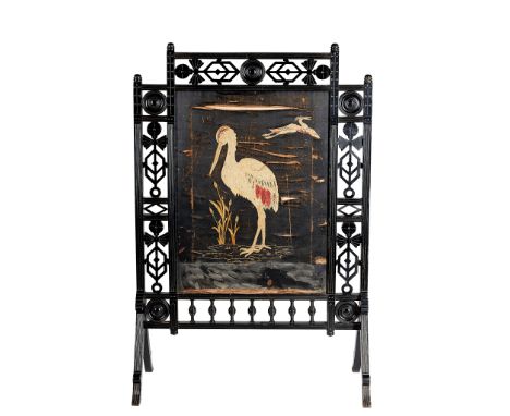 ENGLISH SCHOOL, ATTRIBUTED TO COX &amp; SONS, LONDON AESTHETIC MOVEMENT EBONISED FIRESCREEN, CIRCA 1880with silkwork embroide