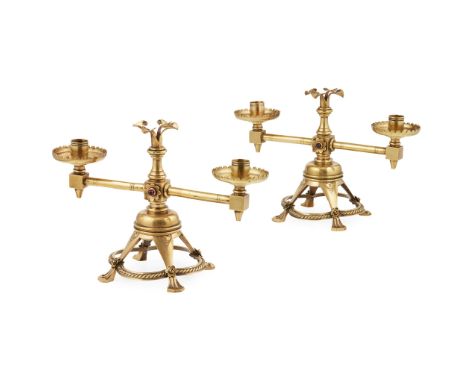 ATTRIBUTED TO HART, SON, PEARD &amp; CO. PAIR OF GOTHIC REVIVAL BRASS CANDELABRA, CIRCA 1870each with central column set with