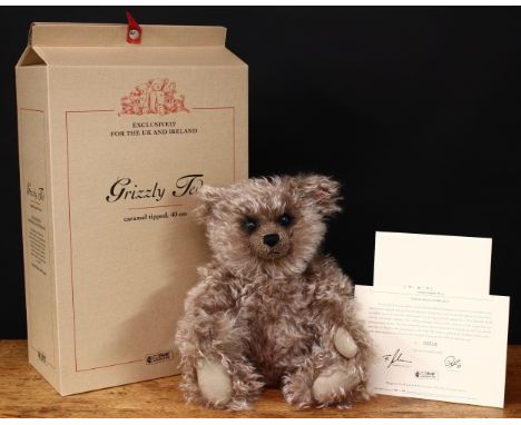 Steiff (Germany) EAN 661402 Grizzly teddy bear, trademark Steiff button to ear with red and white tag, 40cm high, boxed with 