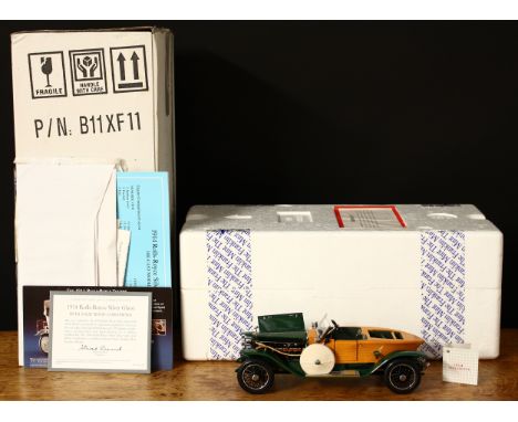 A Franklin Mint Precision Models 1:24 scale 1914 Rolls-Royce Silver Ghost, presented with outer cardboard sleeve, literature 