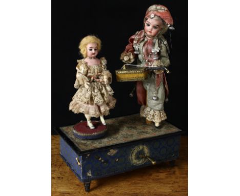 A late 19th century/early 20th century German novelty musical automaton group, 'The Musician and Dancer', comprising a Schoen