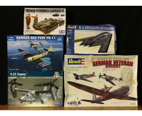 A collection of model kits, comprising Tamiya 1:35 scale 35030*900 German Assault Troops, boxed, 35284*2700 French Armoured C