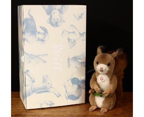 Steiff (Germany) EAN 038761 Kecki musical Squirrel, trademark Steiff button to ear with red and white tag, 22cm high, boxed