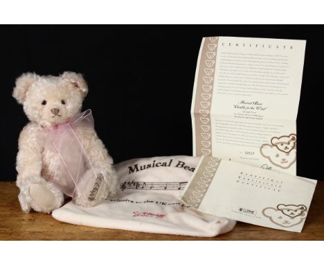 Steiff (Germany) EAN 661624 Musical teddy bear "Candle in the Wind", trademark Steiff button to ear with red and white tag, 3