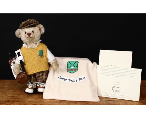 Steiff (Germany) EAN 670671 Golfer teddy bear, trademark Steiff button to ear with red and white tag, 32cm high, presented in