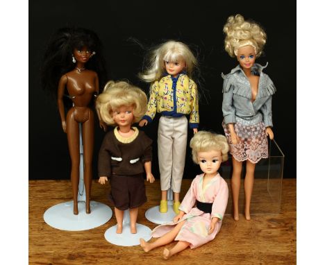 A collection of mid-20th century and later dolls, comprising a late 1970's Sindy's little sister Patch doll, blonde hair, sid
