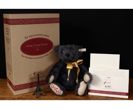 Steiff (Germany) EAN 658044 Galeries Lafayette/Eiffel Tower teddy bear, trademark Steiff button to ear with red and white tag