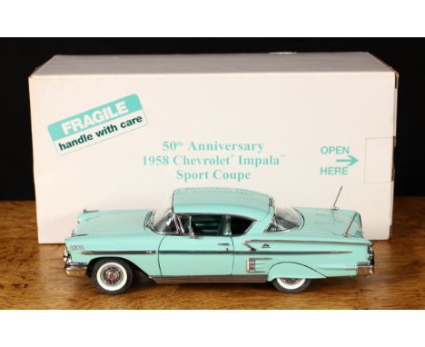 A Danbury Mint 1:24 scale 50th Anniversary 1958 Chevrolet Impala Sport coupe, boxed with original inner polystyrene packaging