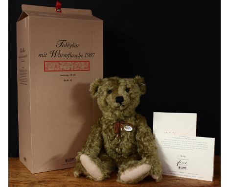 Steiff (Germany) EAN 406621 teddy bear with hot-water bottle 1907 replica, trademark Steiff button to ear with black and whit