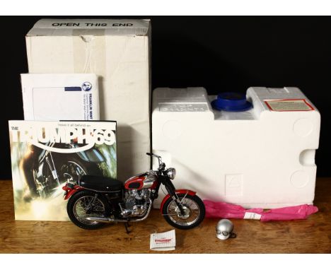 A Franklin Mint Precisions Models 1:10 scale 1969 Triumph Bonneville motorcycle with helmet, presented with outer cardboard s