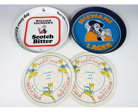Two vintage bar drinks trays together with Babysham printed mats