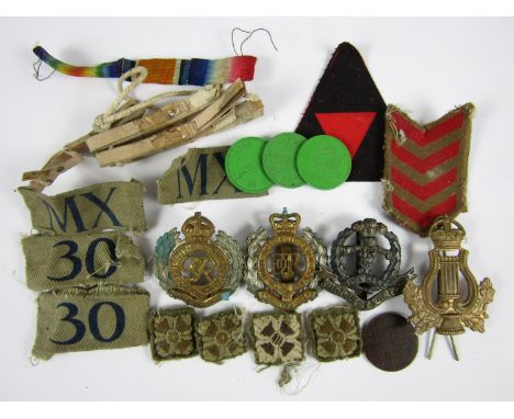 Home Guard cloth badges together with enamel badges, tokens etc