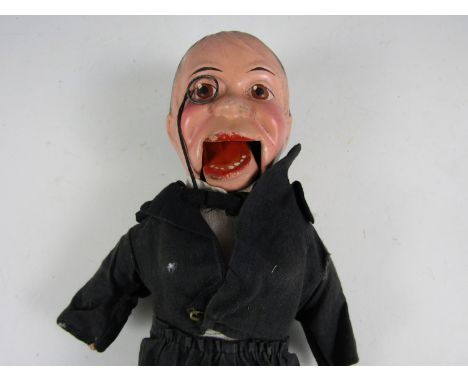 A child's vintage ventriloquist's doll