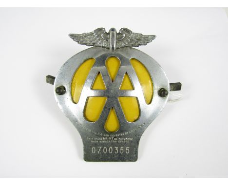 A vintage AA car badge