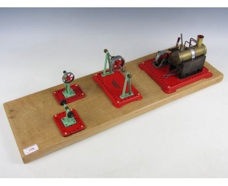 A Mamod stationary engine together with workshop tools