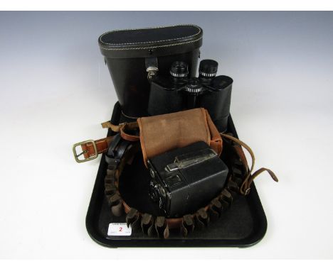 A cased pair of Zenith Special binoculars, together with a cased Kodak Brownie camera and manual, and a vintage shotgun cartr