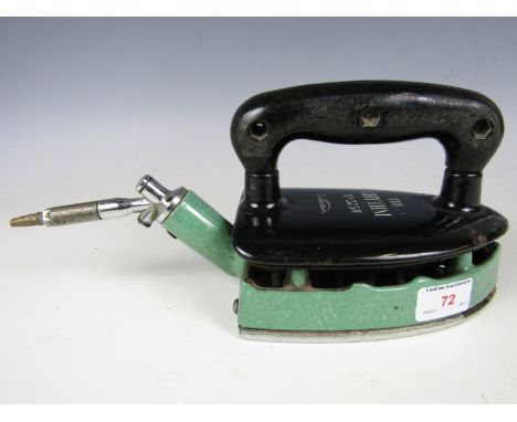 A vintage gas iron