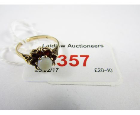 A 9ct gold opal and garnet flowerhead cluster ring