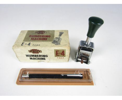 A boxed vintage Kent numbering stamp together with a boxed Parker roller ball pen