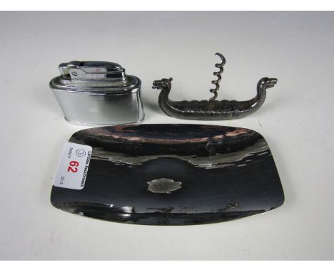 A small Keswick School of Industrial Arts dish together with a Streamline table lighter and a corkscrew